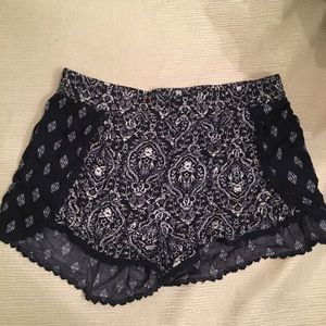 Tilly’s Navy blue cloth patterned shorts